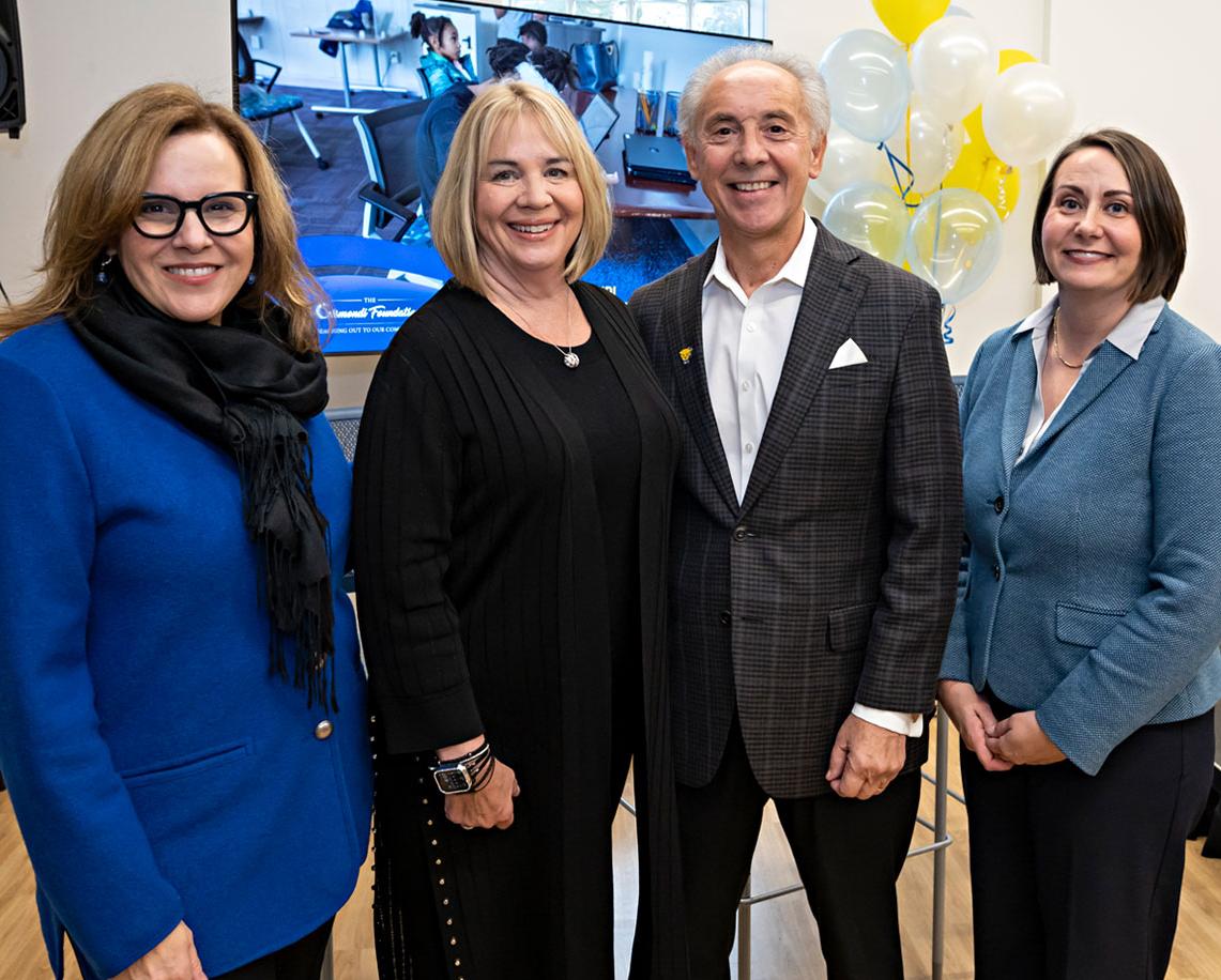 Chancellor Gabel, Lisa Gismond, John Gismondi, and Lina Dostilio standing together